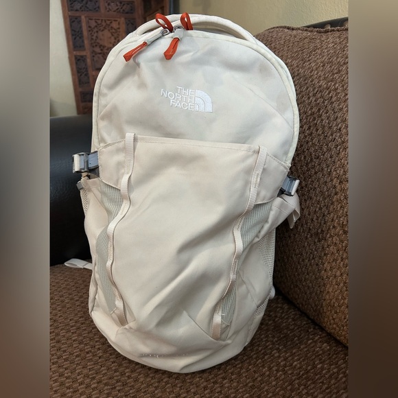 The North Face Cream Backpack with Orange Zipper Pulls - Picture 2 of 9